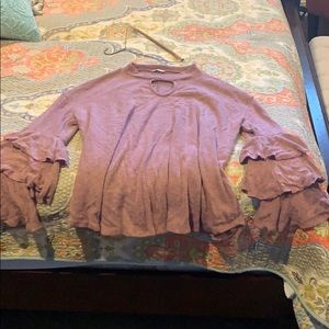 pink ruffled sweater!